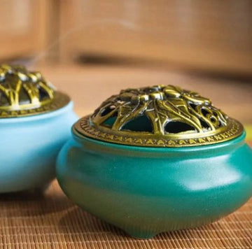 Three-legged peony-lidded incense burner