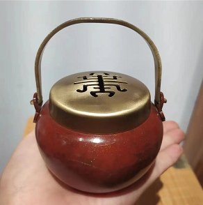 Handheld incense burner