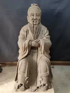Hand-painted clay statues of deities from the Confucius Mission