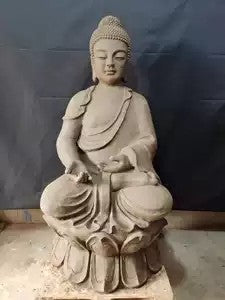 Hand-painted clay statue of the Buddha