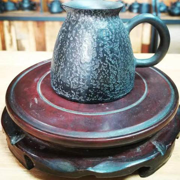 Black pottery serving jug