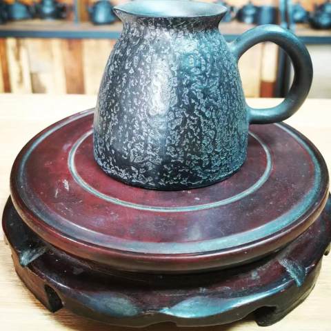 Black pottery serving jug